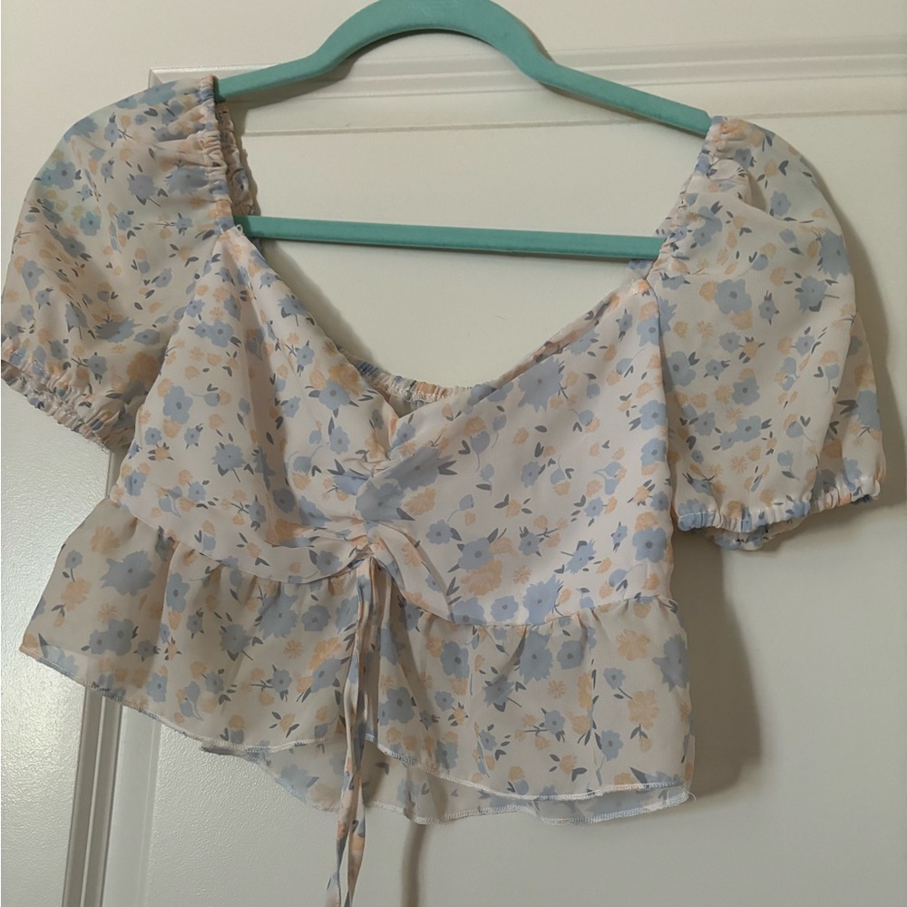 Floral blue, white, and yellow crop top